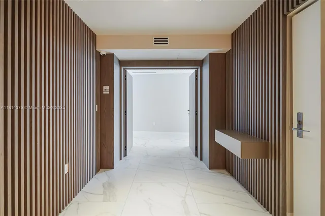 a view of a wooden door with a large window