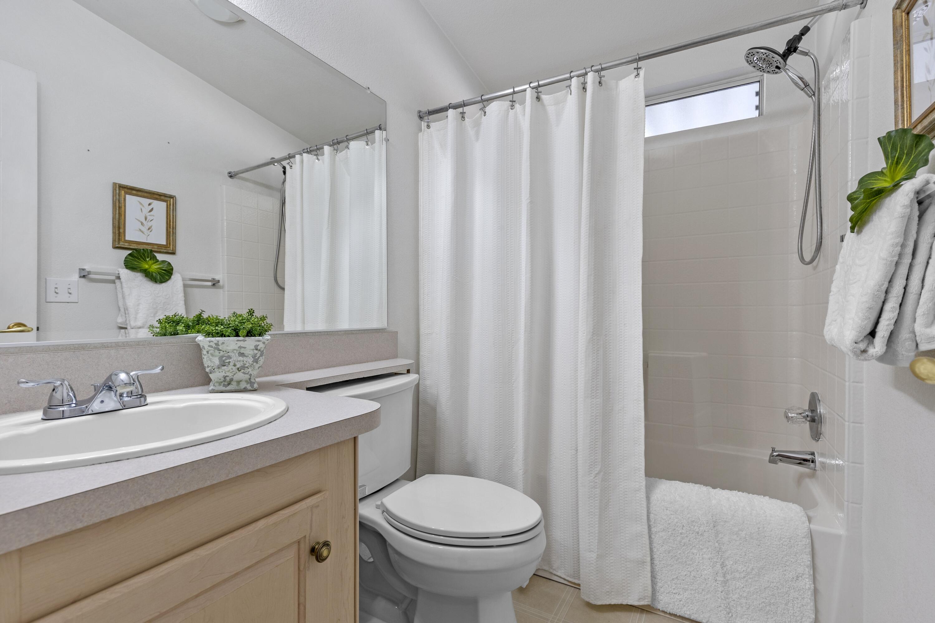 14556 East Tehachapi Boulevard Tehachapi, CA 93561 - Photo 17 of 23 a bathroom with a sink toilet and shower