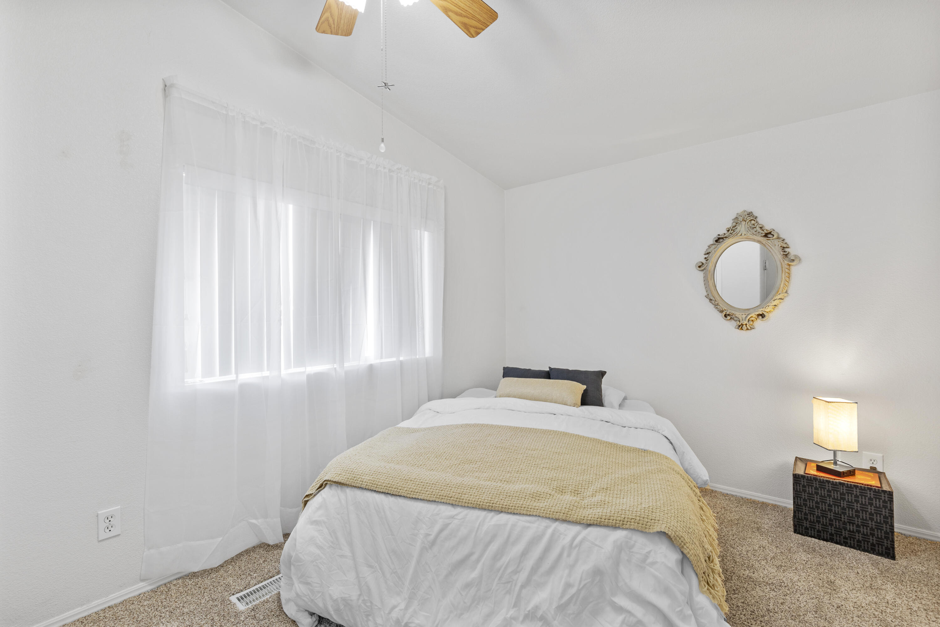 14556 East Tehachapi Boulevard Tehachapi, CA 93561 - Photo 20 of 23 a bedroom with a bed and cabinets