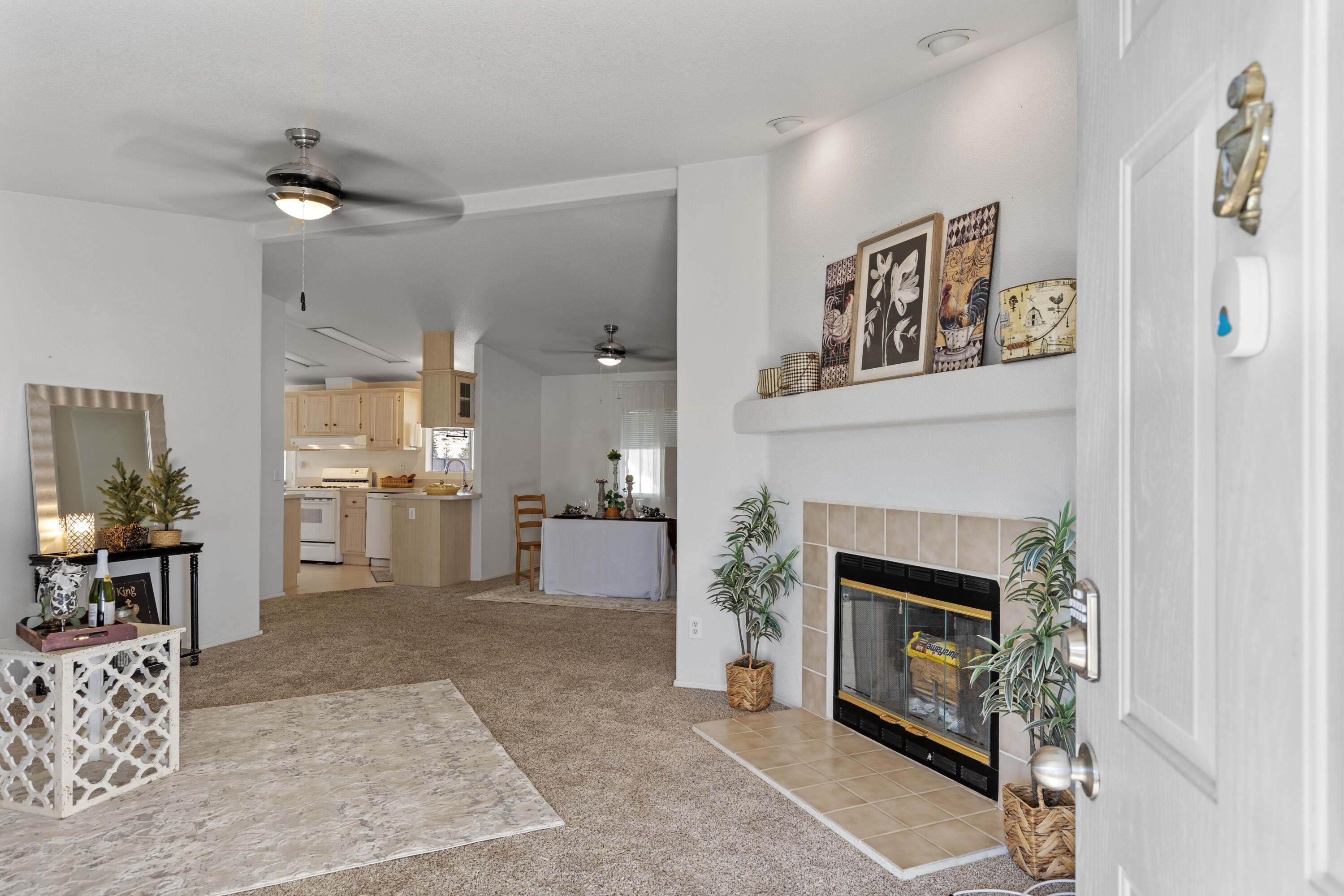 14556 East Tehachapi Boulevard Tehachapi, CA 93561 - Photo 3 of 23 a living room with furniture and a fireplace