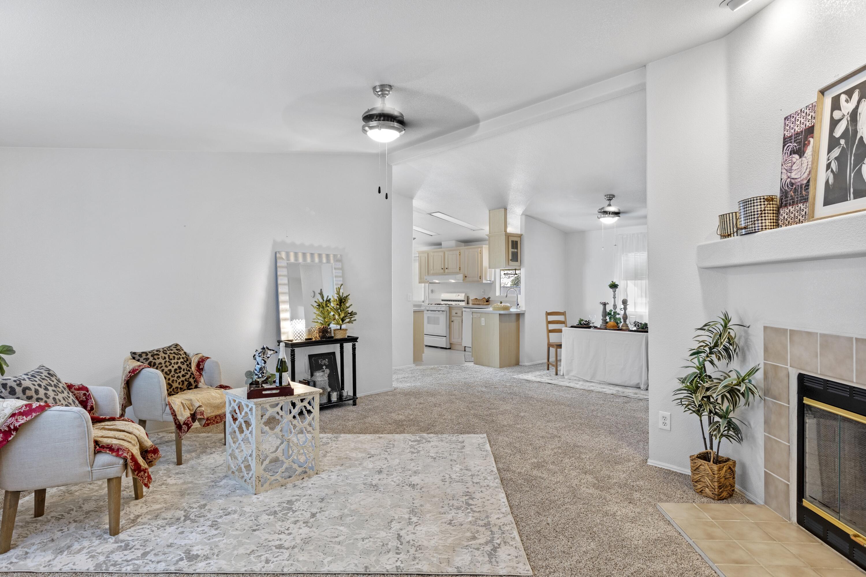 14556 East Tehachapi Boulevard Tehachapi, CA 93561 - Photo 4 of 23 a living room with furniture and a fireplace