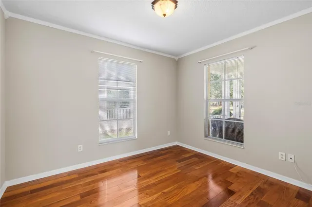 an empty room with windows