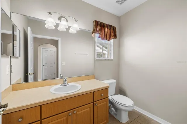 a white bath tub sitting next to a window