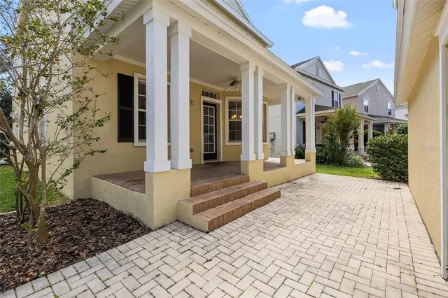 a view of an empty room with a fireplace