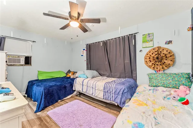 a bed room with a bed and a couch