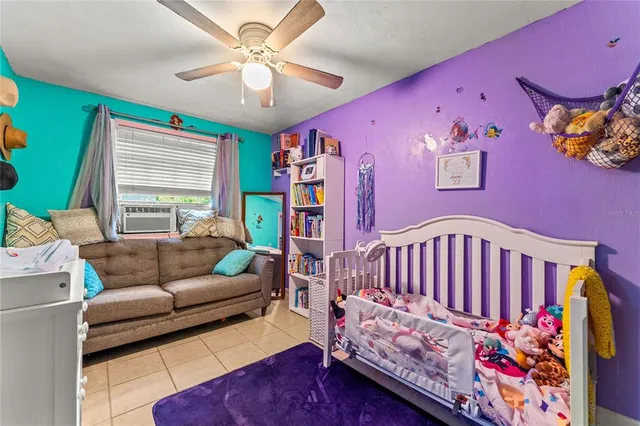 a bedroom with furniture and a couch