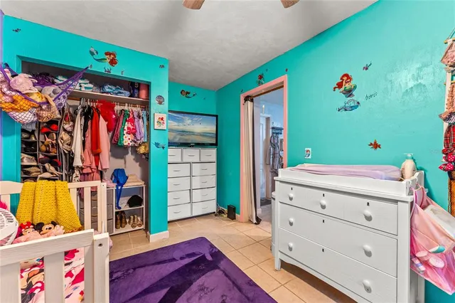 a bed room with a bed and a bed