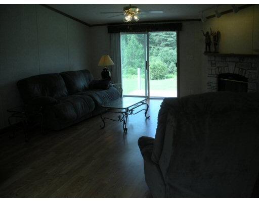 19 Potter Road Lisbon, ME 04252 - Photo 12 of 21 Living Room. With sliders to the...