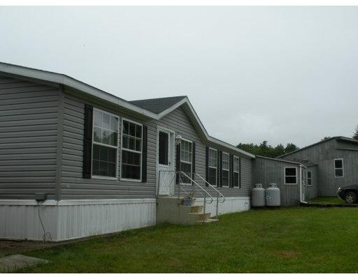 19 Potter Road Lisbon, ME 04252 - Photo 3 of 21 Exterior Front. Covered/screened...
