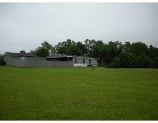 19 Potter Road Lisbon, ME 04252 - Photo 4 of 21 Exterior Back. Fenced area for...