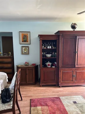 a bedroom with a bed and a view of bathroom