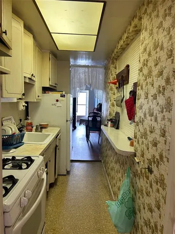 a room with a chair and storage