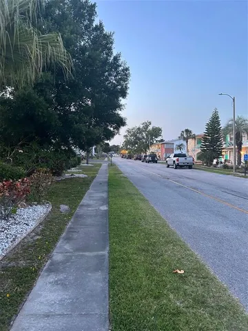 a childrens park with lots of trees