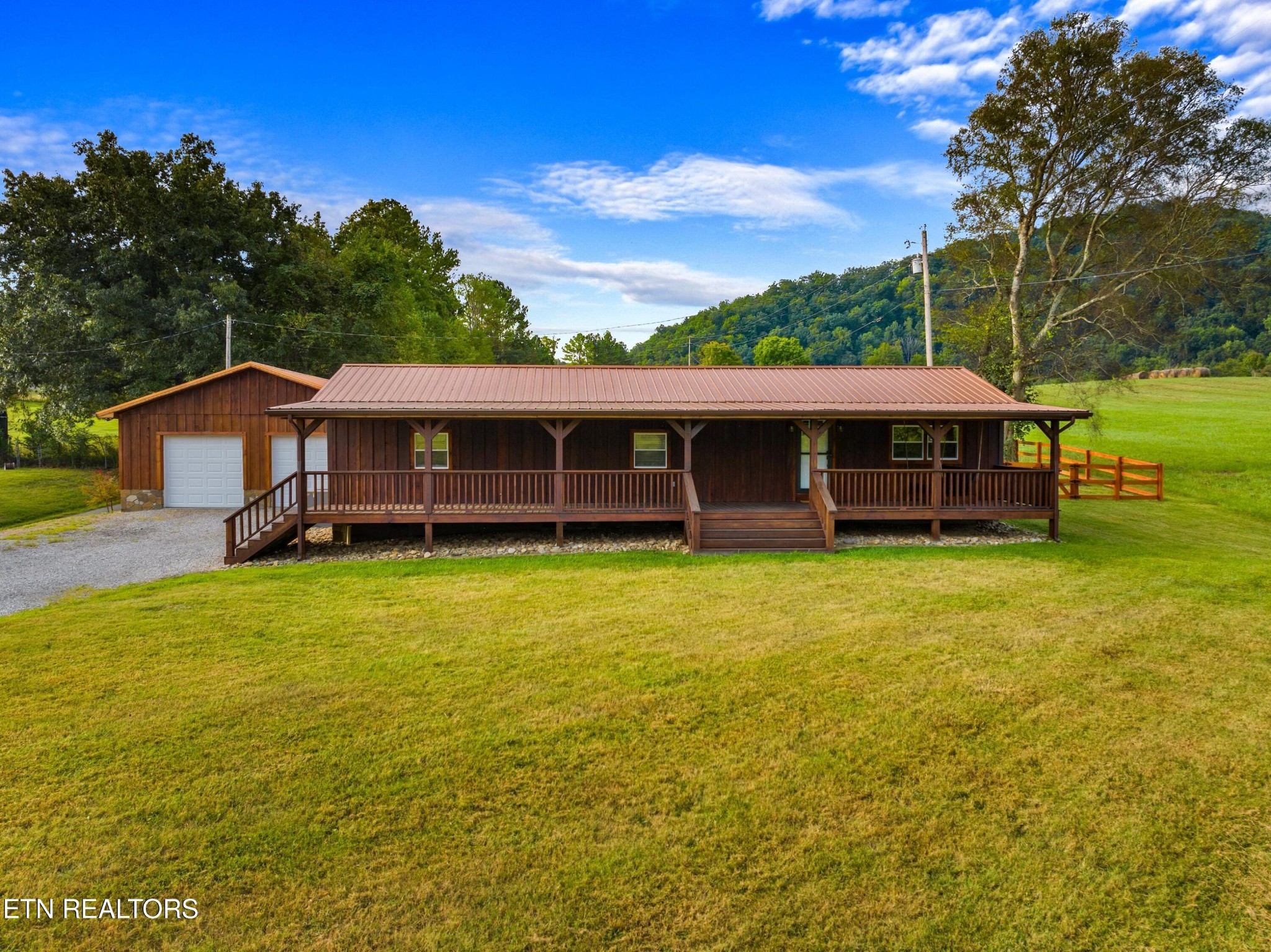 2811 Eugene Road Newport, TN 37821 - Photo 1 of 33 a front view of a house with a yard