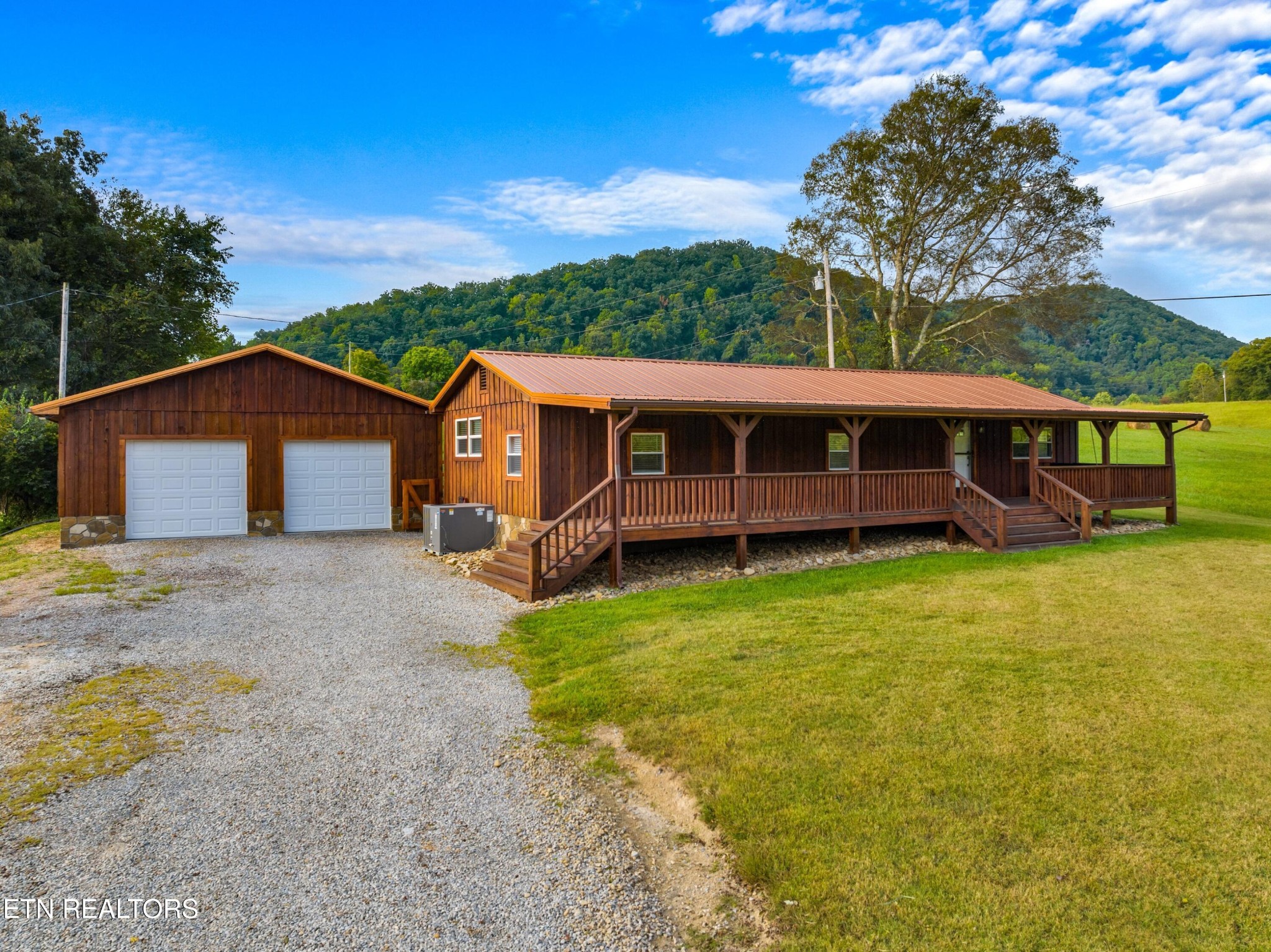 2811 Eugene Road Newport, TN 37821 - Photo 2 of 33 a view of a house with a yard and large tree