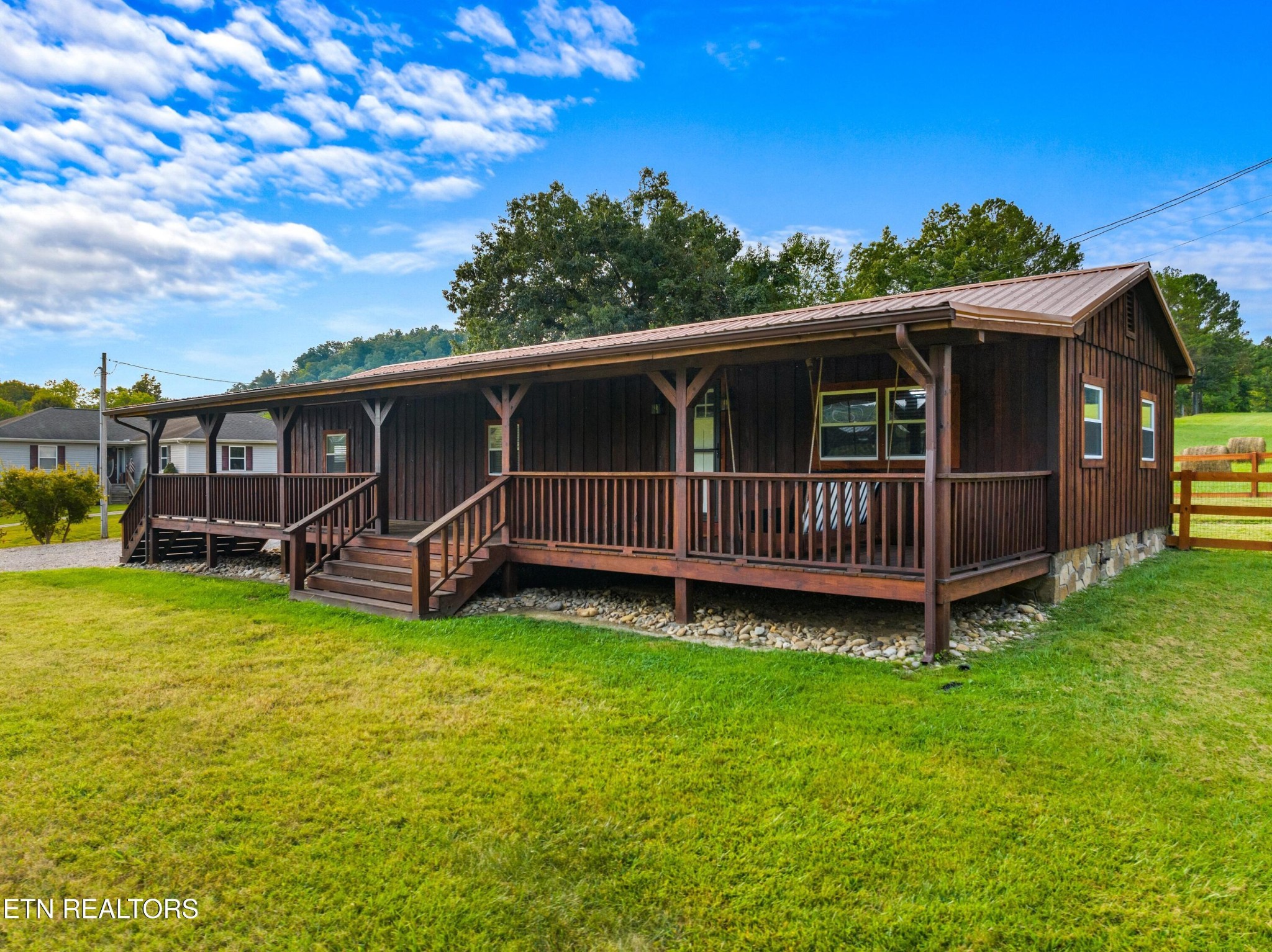 2811 Eugene Road Newport, TN 37821 - Photo 3 of 33 a view of a house with wooden deck and furniture