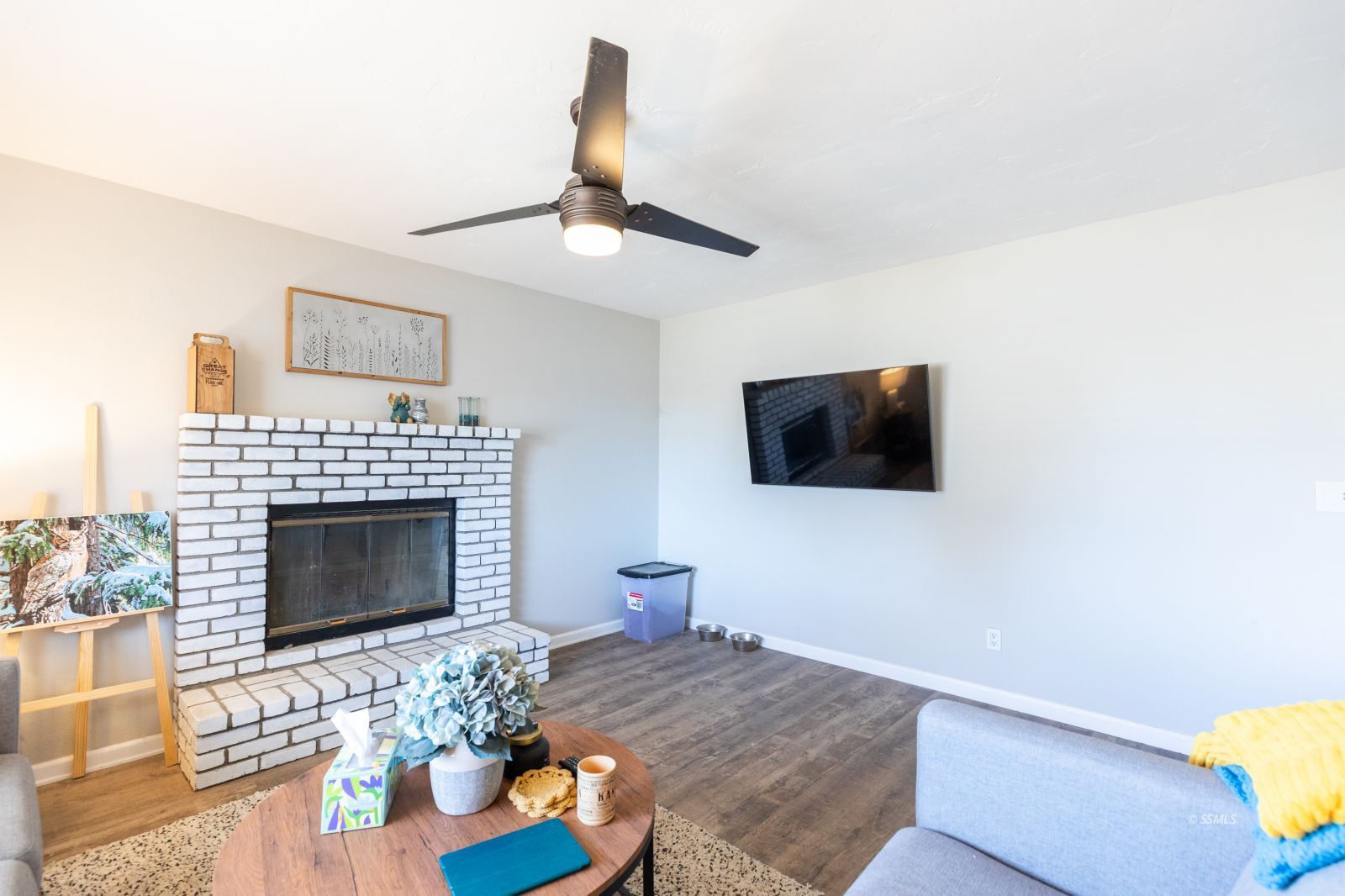 332 Sims Street Ridgecrest, CA 93555 - Photo 8 of 29 a living room with furniture and a fireplace
