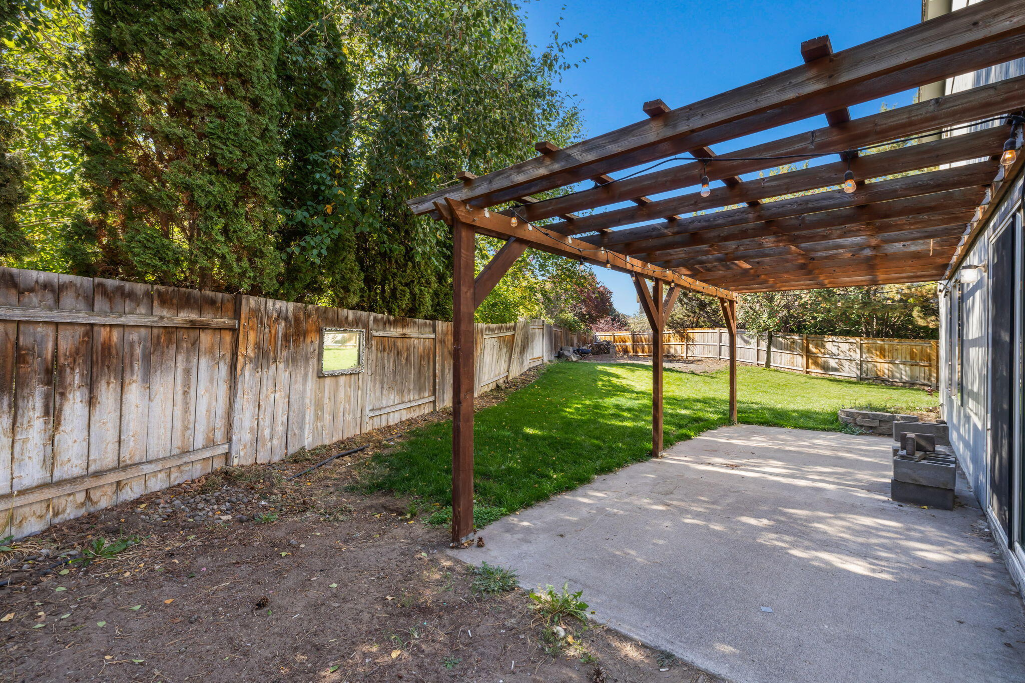 3025 Northeast Raleigh Court Bend, OR 97701 - Photo 26 of 34 Large, sunny patio and backyard. Fully fenced.