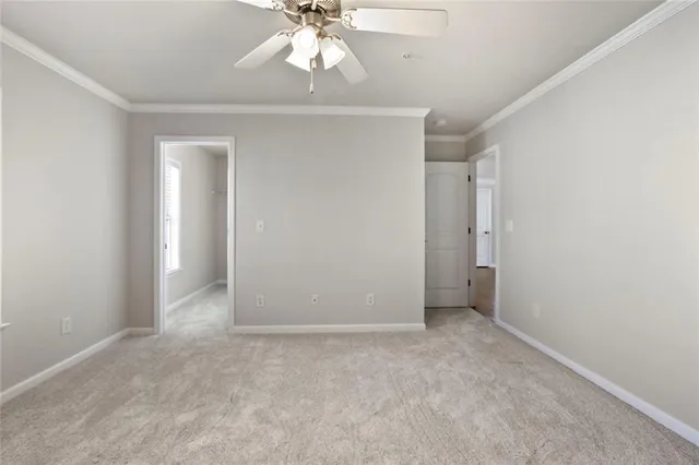an empty room with a view of a bathroom