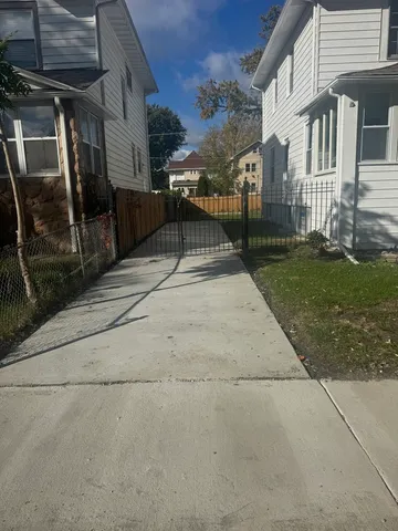 a view of a building with a yard