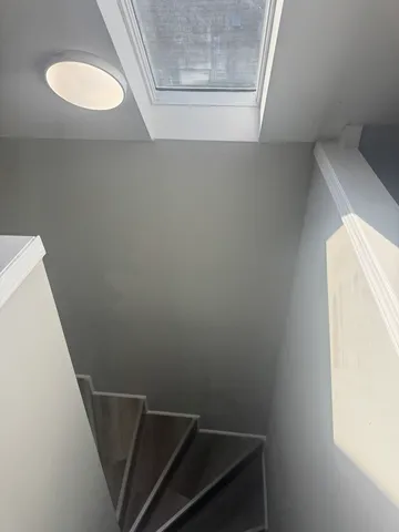 a view of entryway with stairs