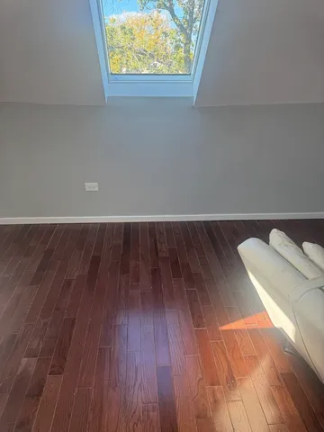 a view of wooden floor in a kitchen