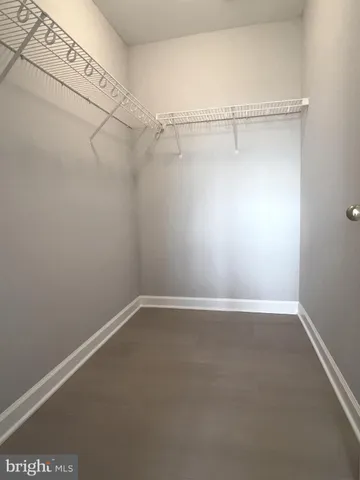 a view of a room with racks on the wall