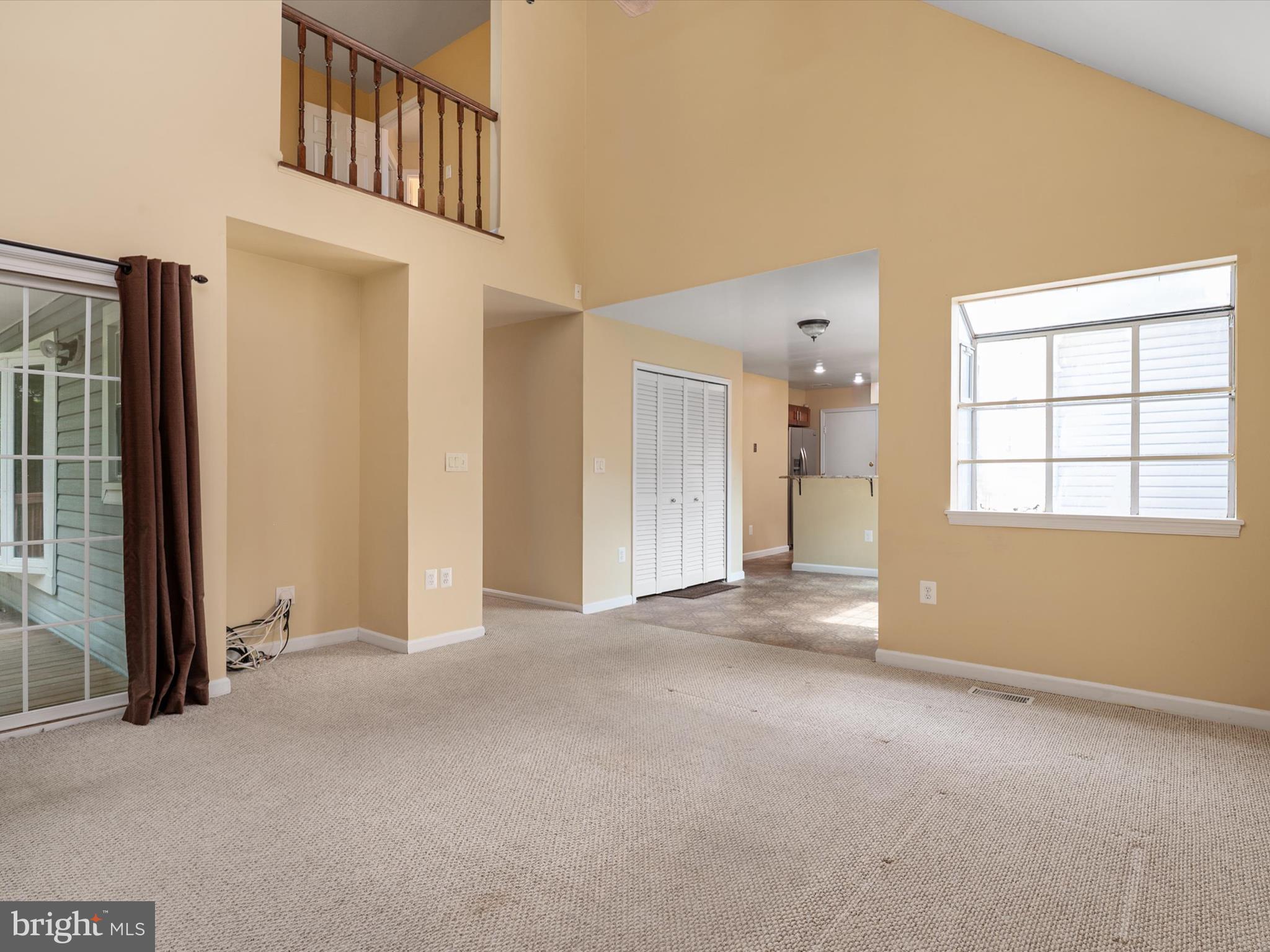 14226 Greenview Drive Laurel, MD 20708 - Photo 16 of 46 an empty room with windows