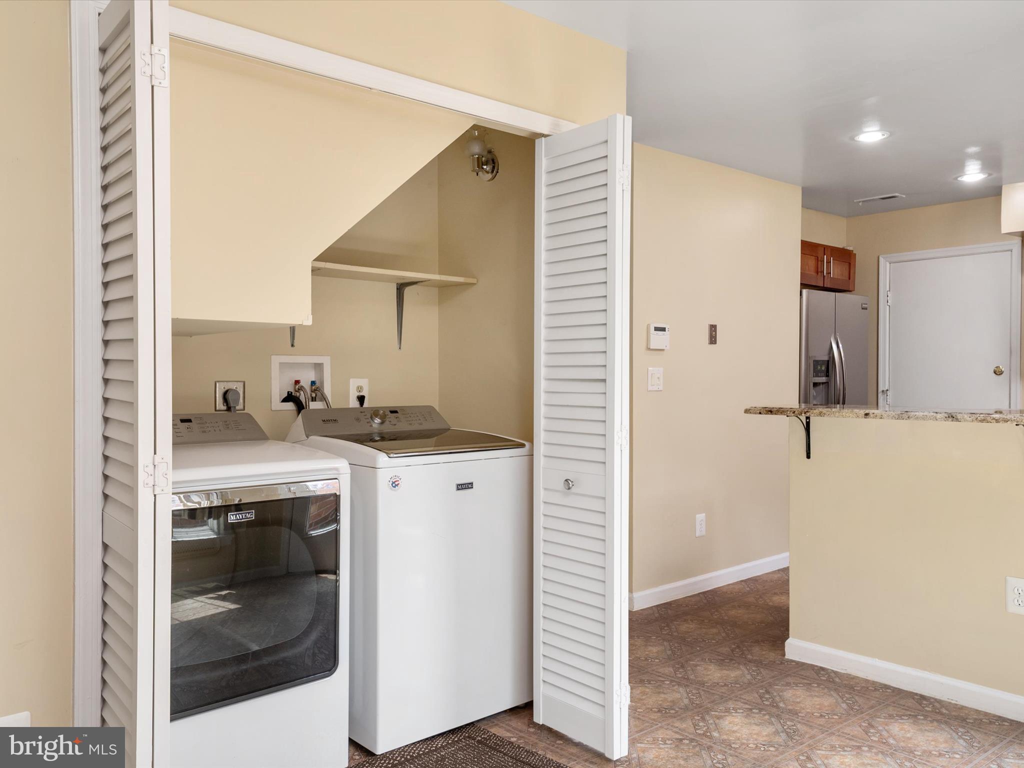 14226 Greenview Drive Laurel, MD 20708 - Photo 22 of 46 a bathroom with a sink and a mirror