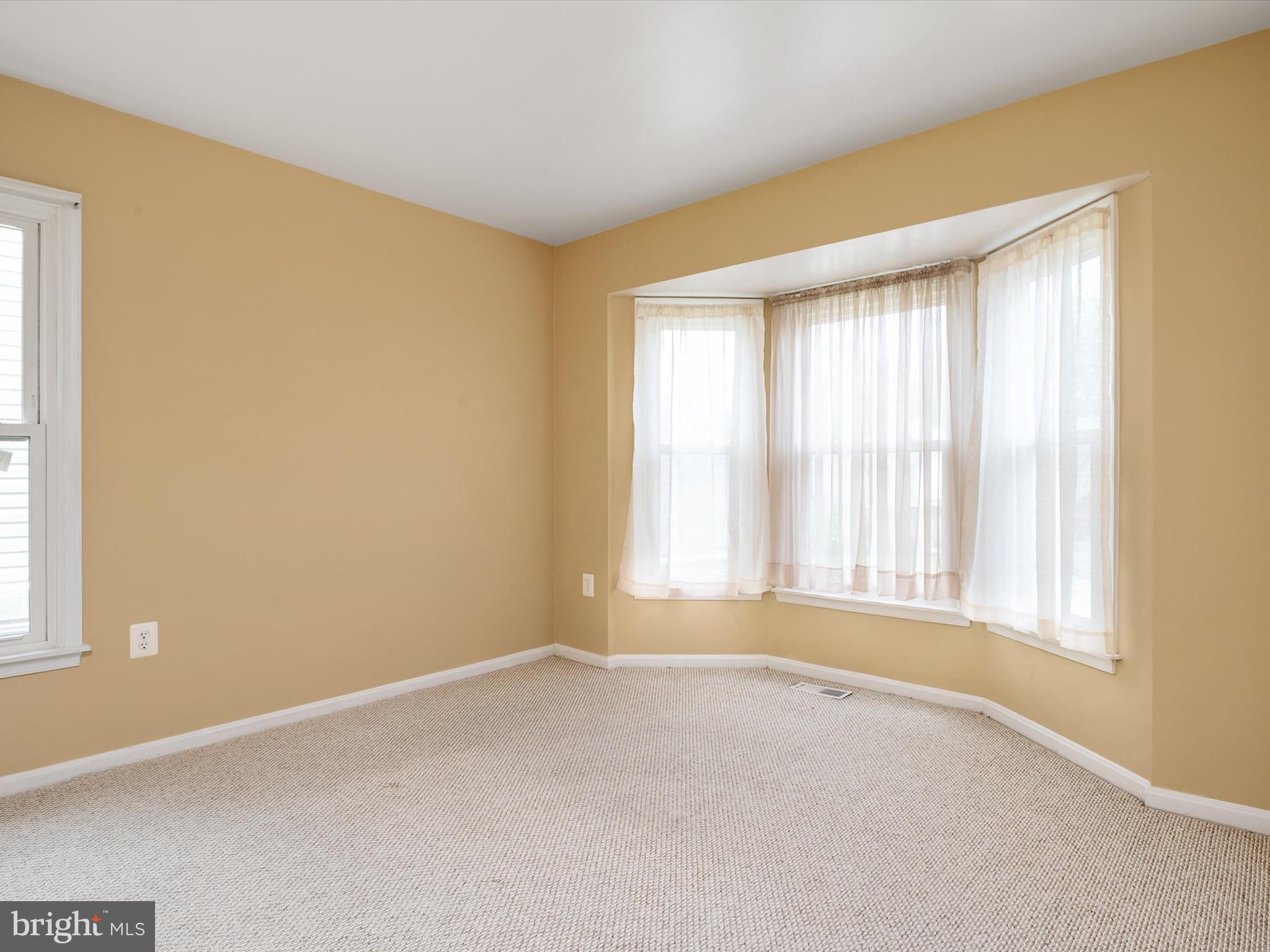 14226 Greenview Drive Laurel, MD 20708 - Photo 27 of 46 a view of an empty room with a window