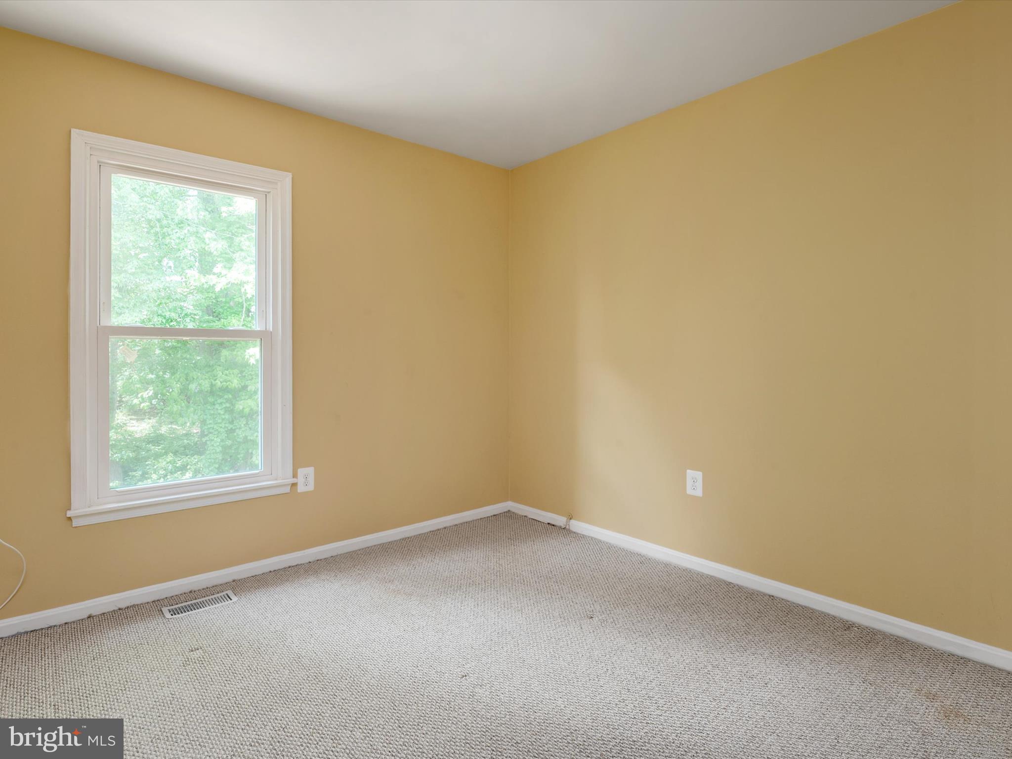 14226 Greenview Drive Laurel, MD 20708 - Photo 30 of 46 an empty room with a window