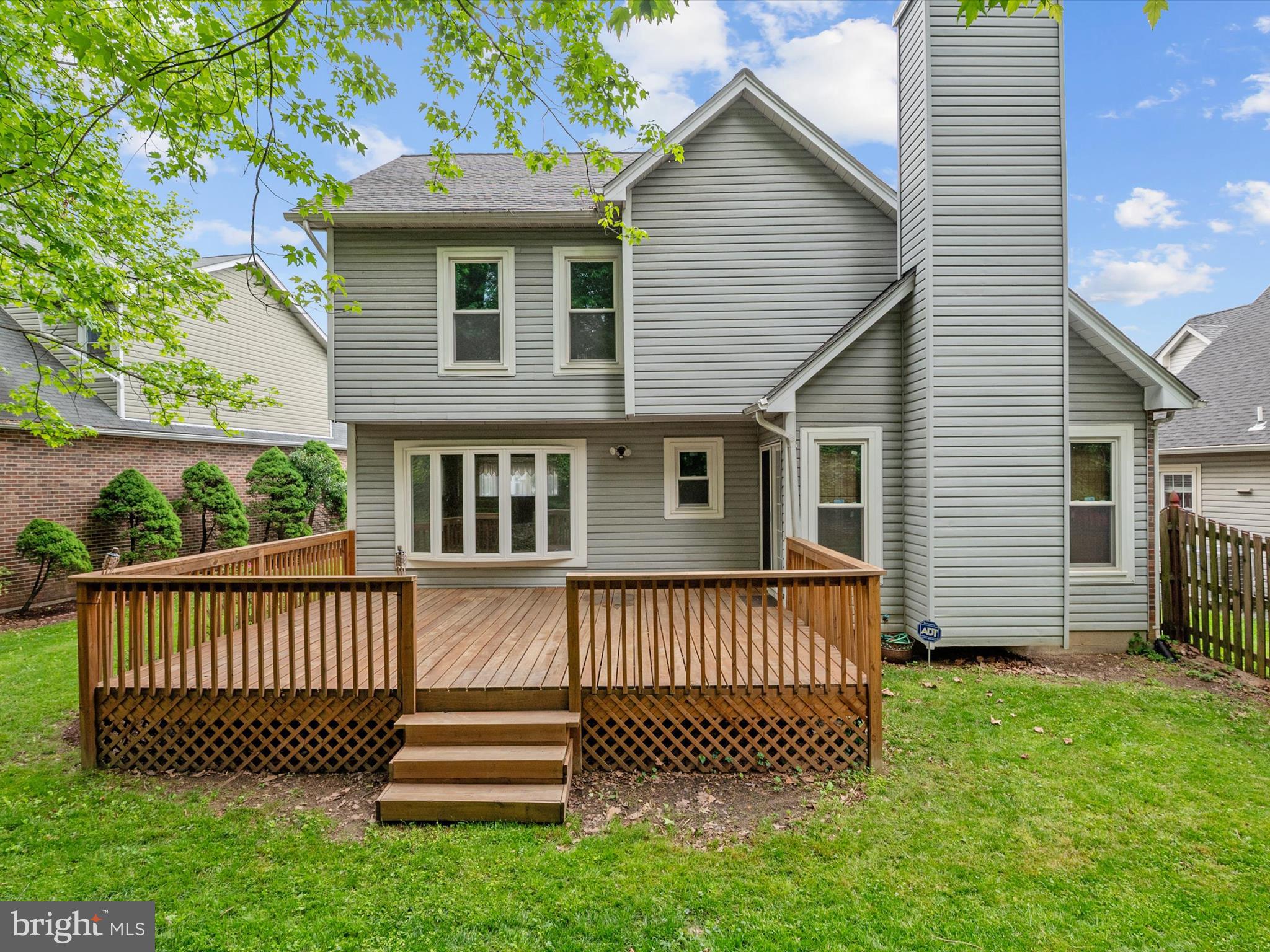 14226 Greenview Drive Laurel, MD 20708 - Photo 41 of 46 a front view of a house with a garden