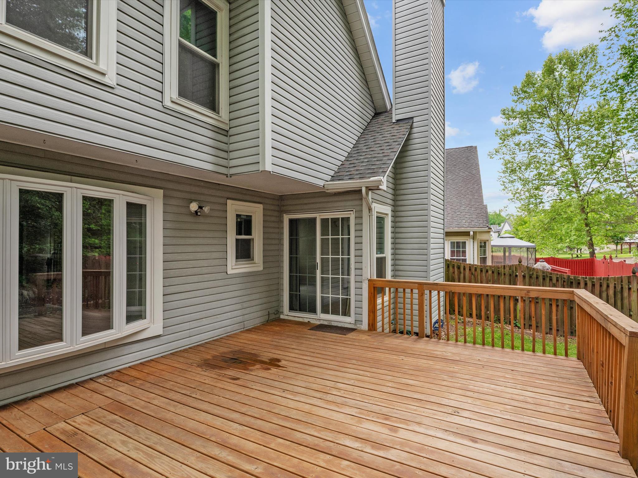14226 Greenview Drive Laurel, MD 20708 - Photo 44 of 46 a view of a house with wooden deck