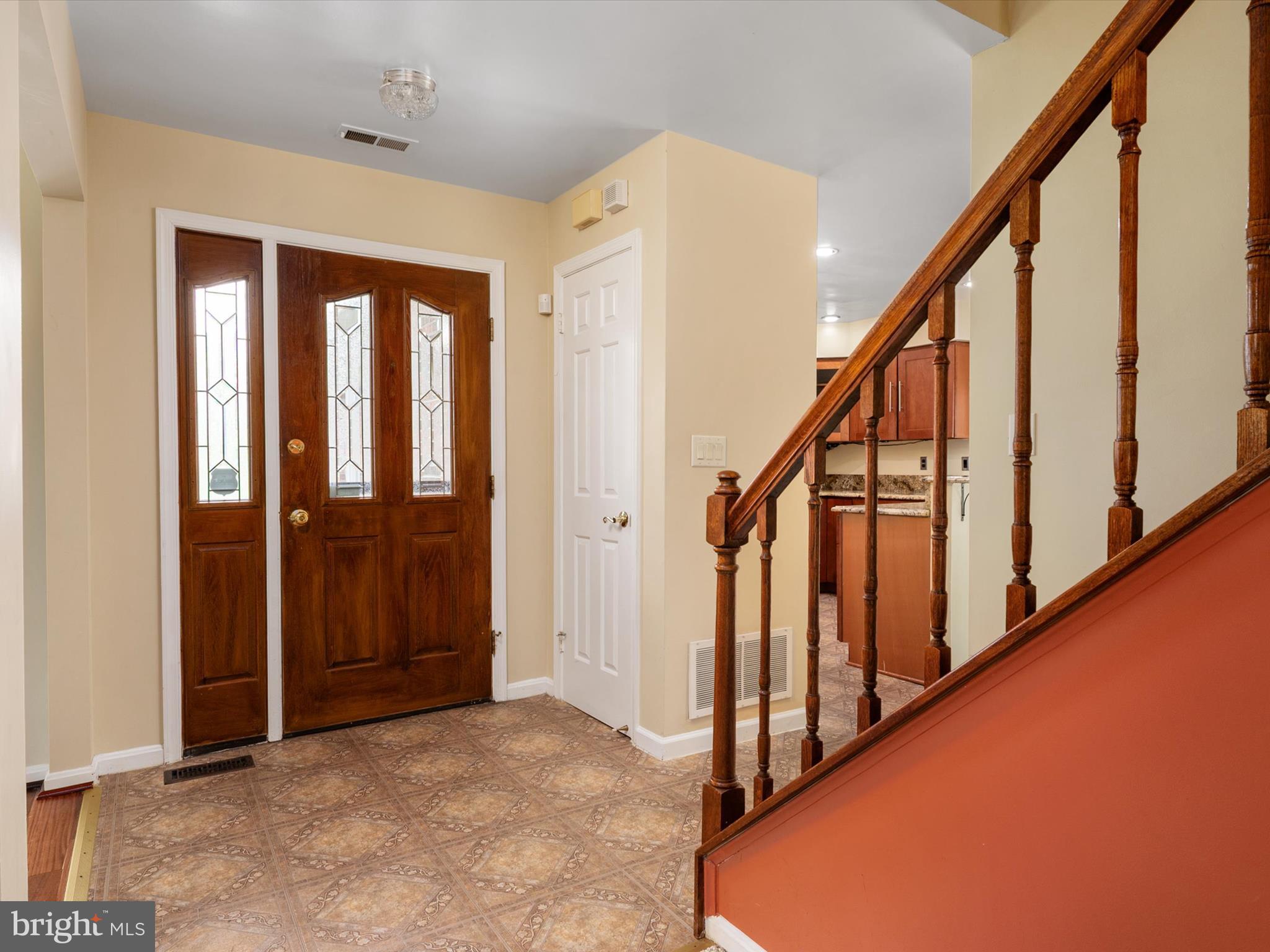 14226 Greenview Drive Laurel, MD 20708 - Photo 6 of 46 a view of an entryway with staircase