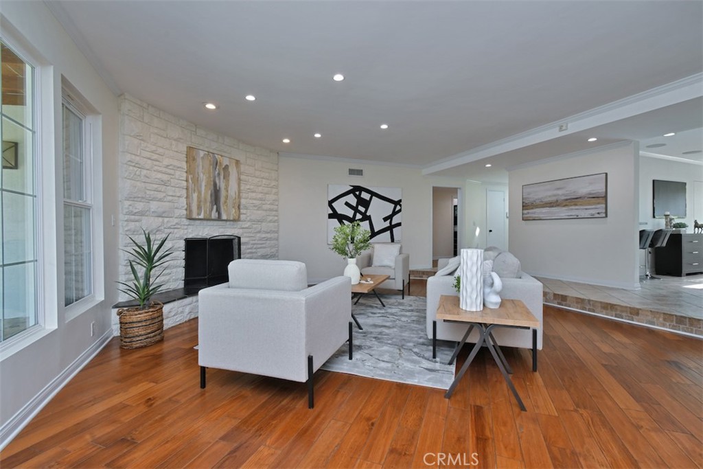 3935 Bon Homme Road Calabasas, CA 91302 - Photo 11 of 64 a living room with furniture and a wooden floor