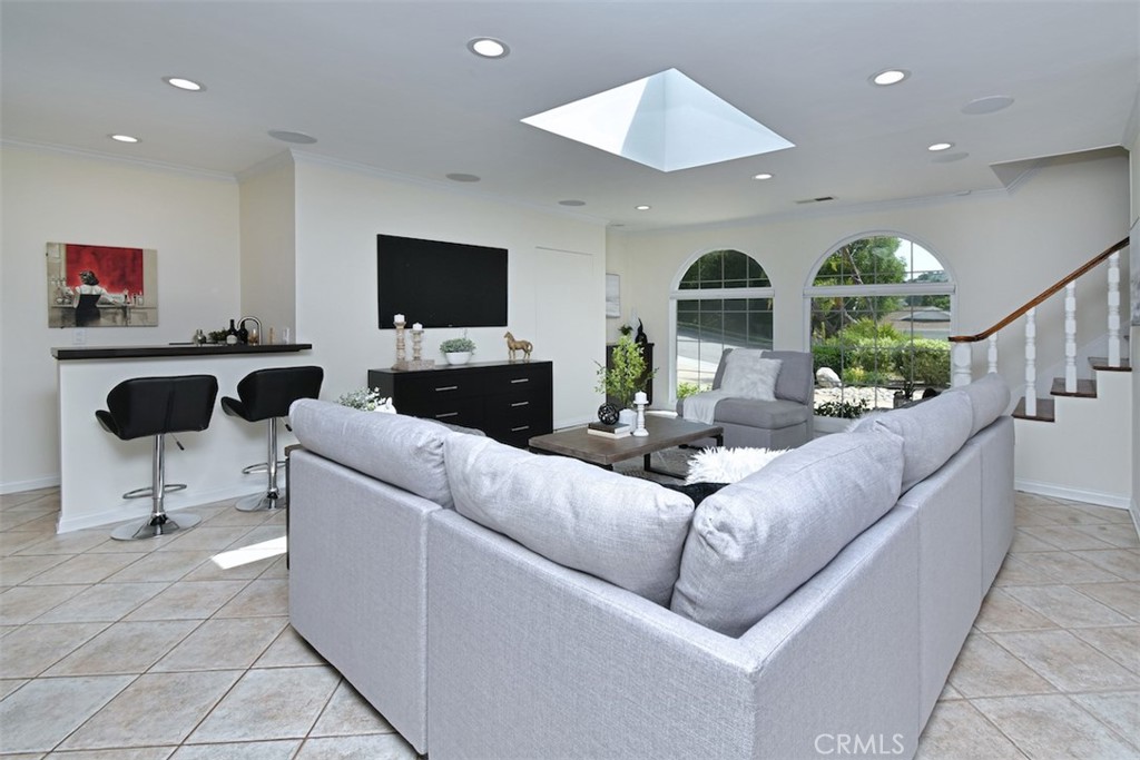 3935 Bon Homme Road Calabasas, CA 91302 - Photo 17 of 64 a living room with furniture and a flat screen tv