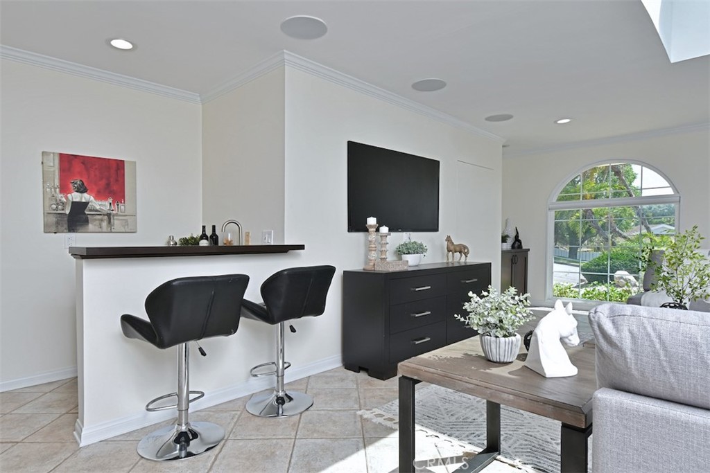 3935 Bon Homme Road Calabasas, CA 91302 - Photo 18 of 64 a living room with furniture and a flat screen tv
