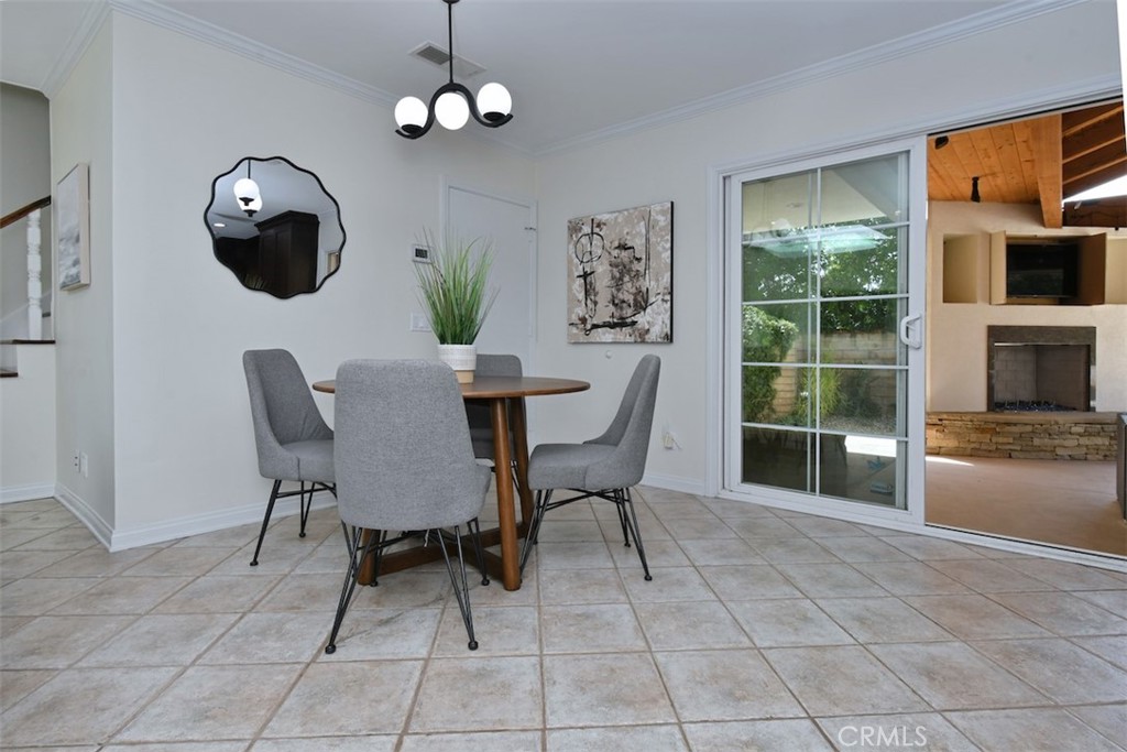 3935 Bon Homme Road Calabasas, CA 91302 - Photo 21 of 64 a view of a dining room with furniture window and outside view