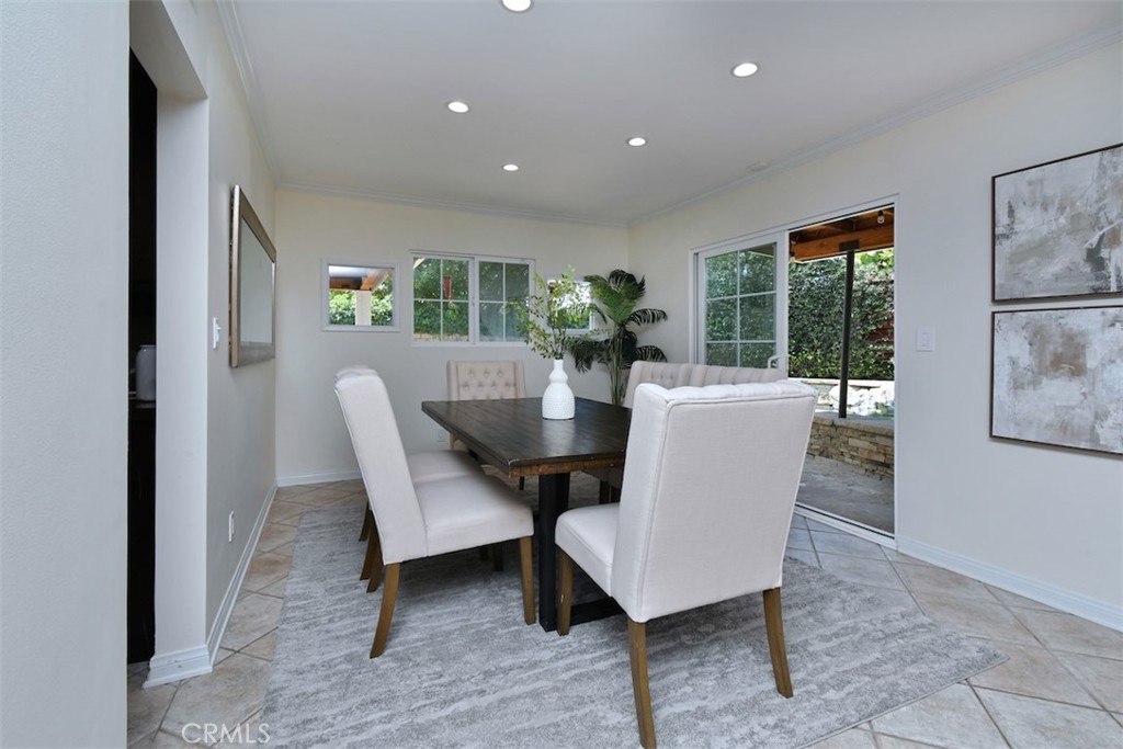 3935 Bon Homme Road Calabasas, CA 91302 - Photo 28 of 64 a view of a dining room with furniture window and outside view