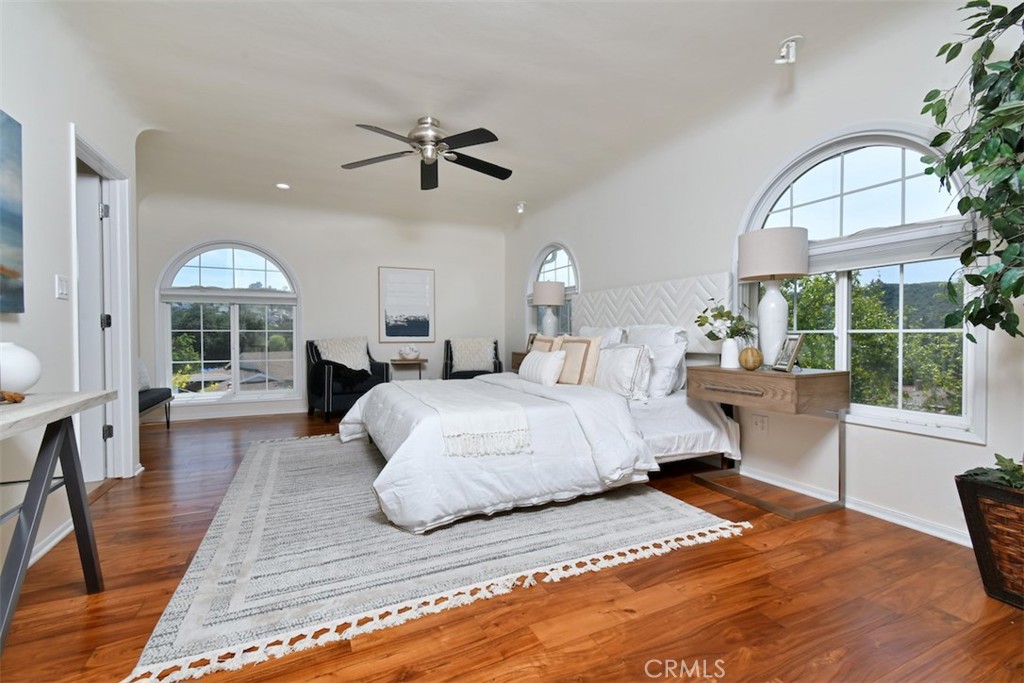 3935 Bon Homme Road Calabasas, CA 91302 - Photo 41 of 64 a bedroom with a large bed and a large window