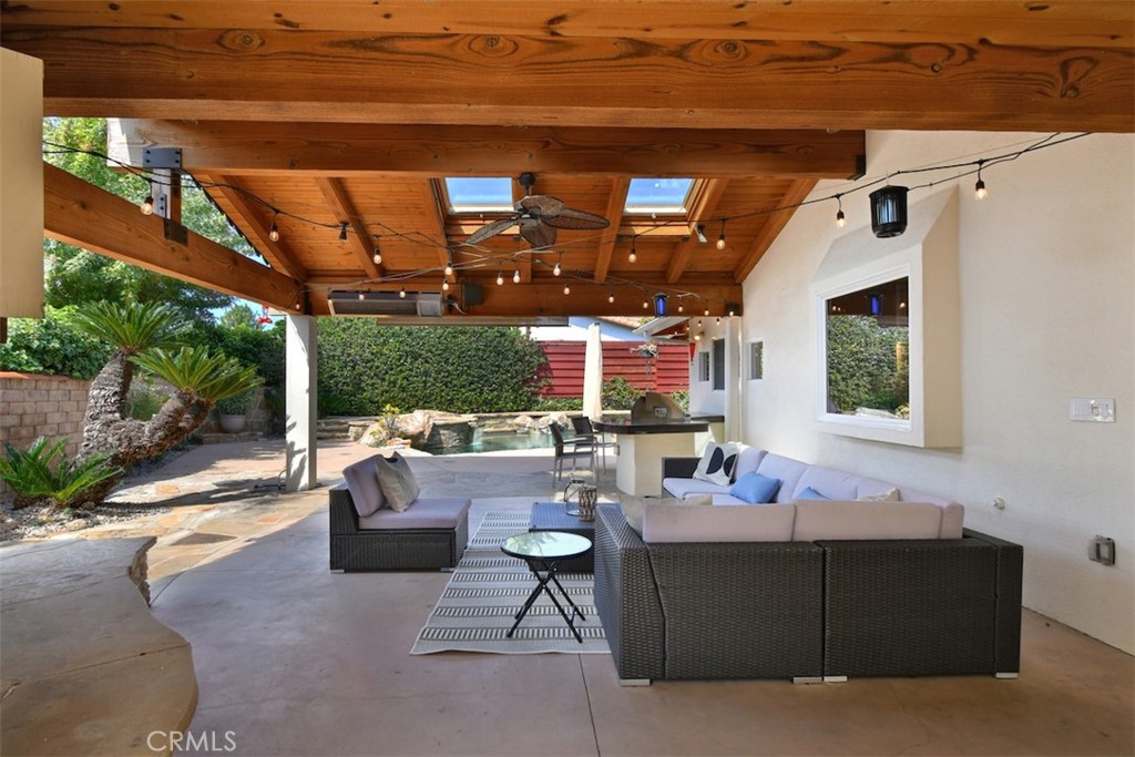 3935 Bon Homme Road Calabasas, CA 91302 - Photo 52 of 64 a living room with furniture and a fireplace