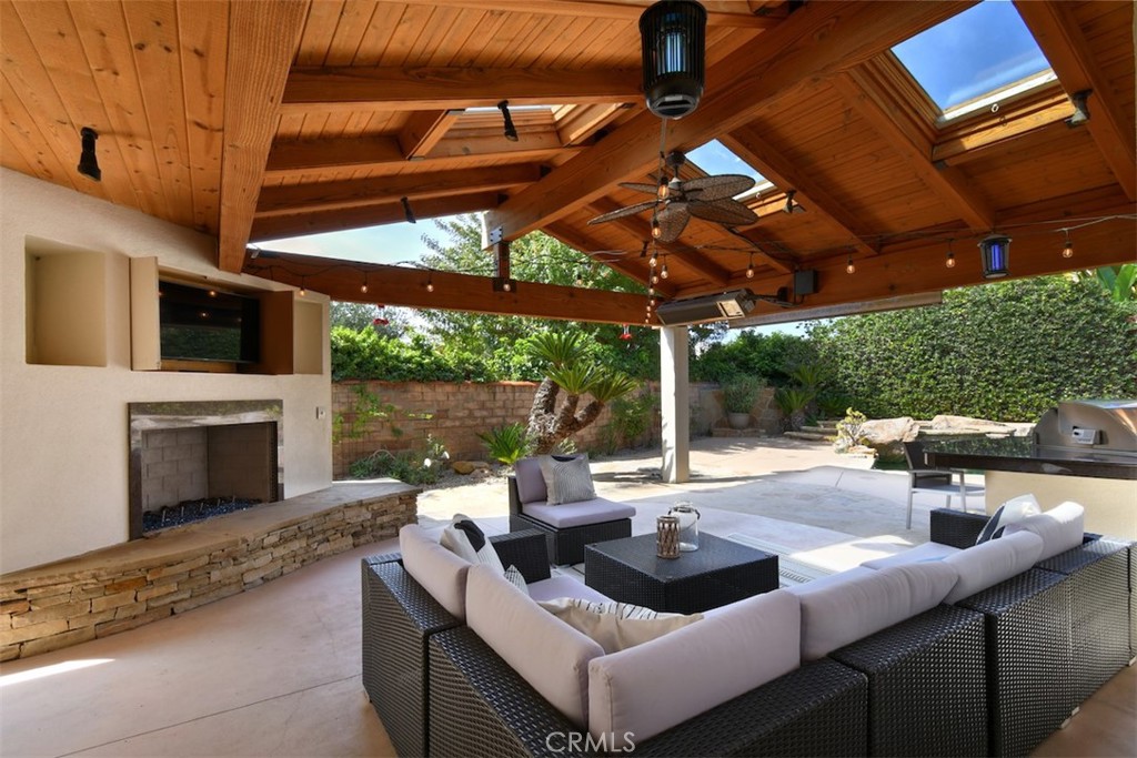3935 Bon Homme Road Calabasas, CA 91302 - Photo 53 of 64 a outdoor space with patio couch and fireplace