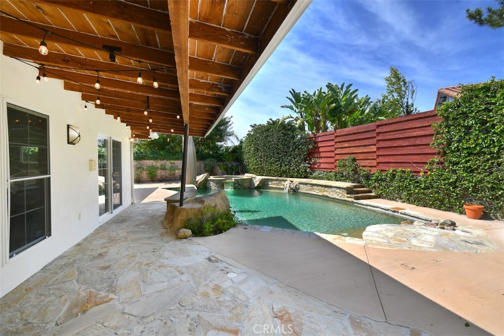 3935 Bon Homme Road Calabasas, CA 91302 - Photo 56 of 64 a backyard of a house with garden and plants