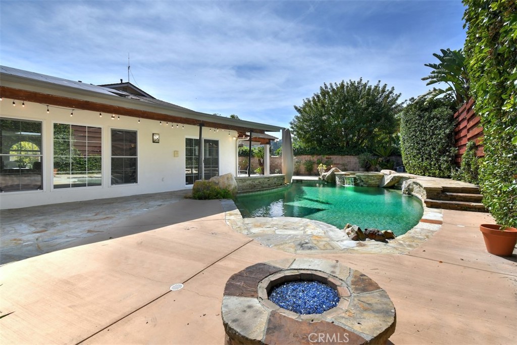 3935 Bon Homme Road Calabasas, CA 91302 - Photo 62 of 64 front view of a house with a garden