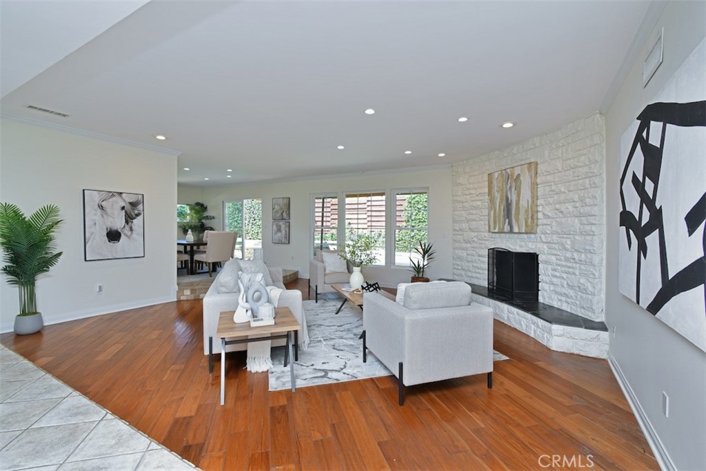 3935 Bon Homme Road Calabasas, CA 91302 - Photo 8 of 64 a living room with furniture and a wooden floor