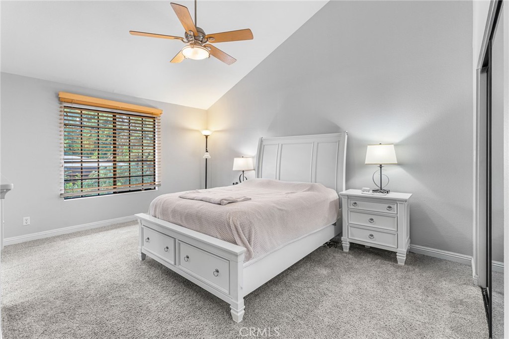 515 South Madison Avenue, Unit 2 Pasadena, CA 91101 - Photo 15 of 35 a spacious bedroom with a bed and a ceiling fan