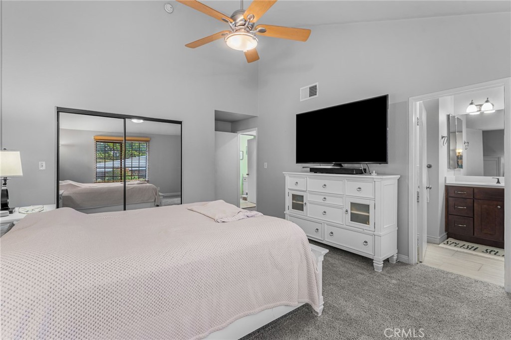 515 South Madison Avenue, Unit 2 Pasadena, CA 91101 - Photo 17 of 35 a bedroom with a bed tv and a window