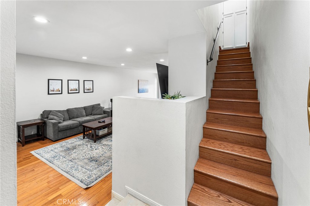 515 South Madison Avenue, Unit 2 Pasadena, CA 91101 - Photo 20 of 35 a living room with furniture and a stair