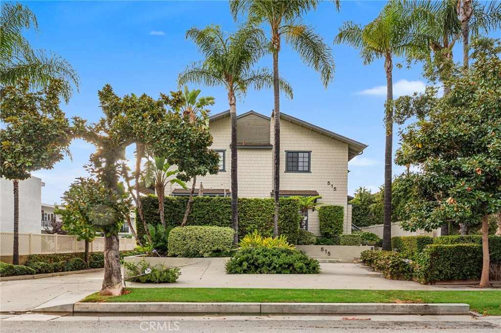 515 South Madison Avenue, Unit 2 Pasadena, CA 91101 - Photo 2 of 35 a front view of a house with a yard