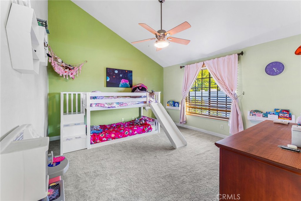 515 South Madison Avenue, Unit 2 Pasadena, CA 91101 - Photo 21 of 35 a bedroom with furniture and a flat screen tv